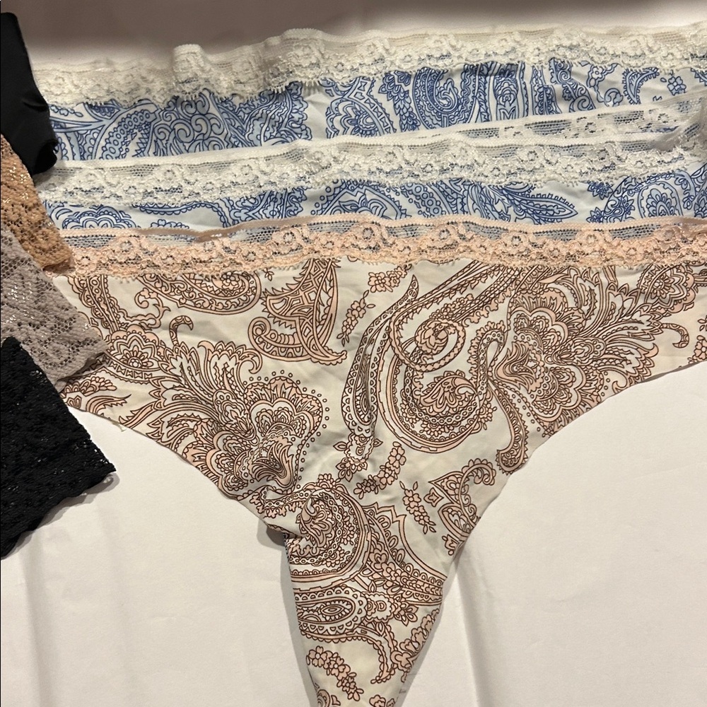9 pair of Victoria’s Secret thong panties. Size large - Picture 5 of 8